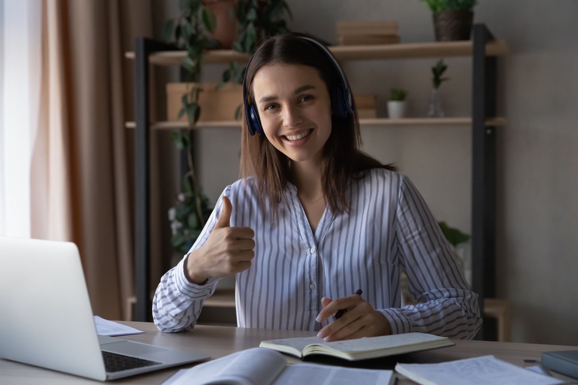 Happy business school student girl recommending training course